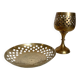 Lattice brass catchall and candlestick.