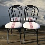 4 vintage black metal bistro chairs