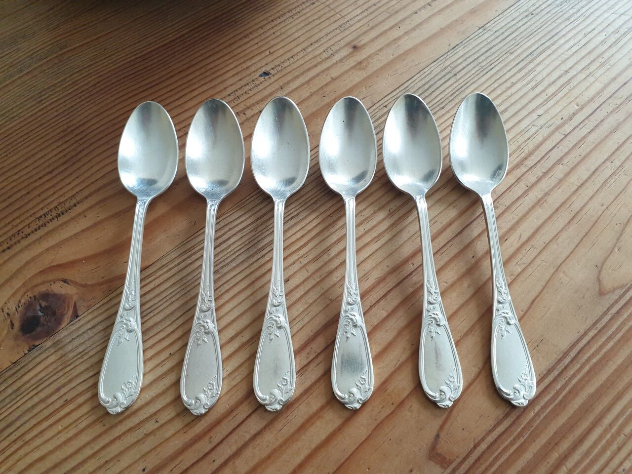 Small old silver metal spoons