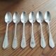 Small old silver metal spoons