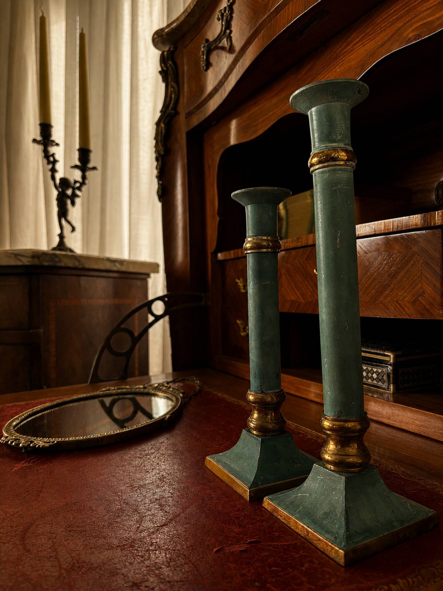 Exceptional pair of large candlesticks in patinated greenish-blue brass.