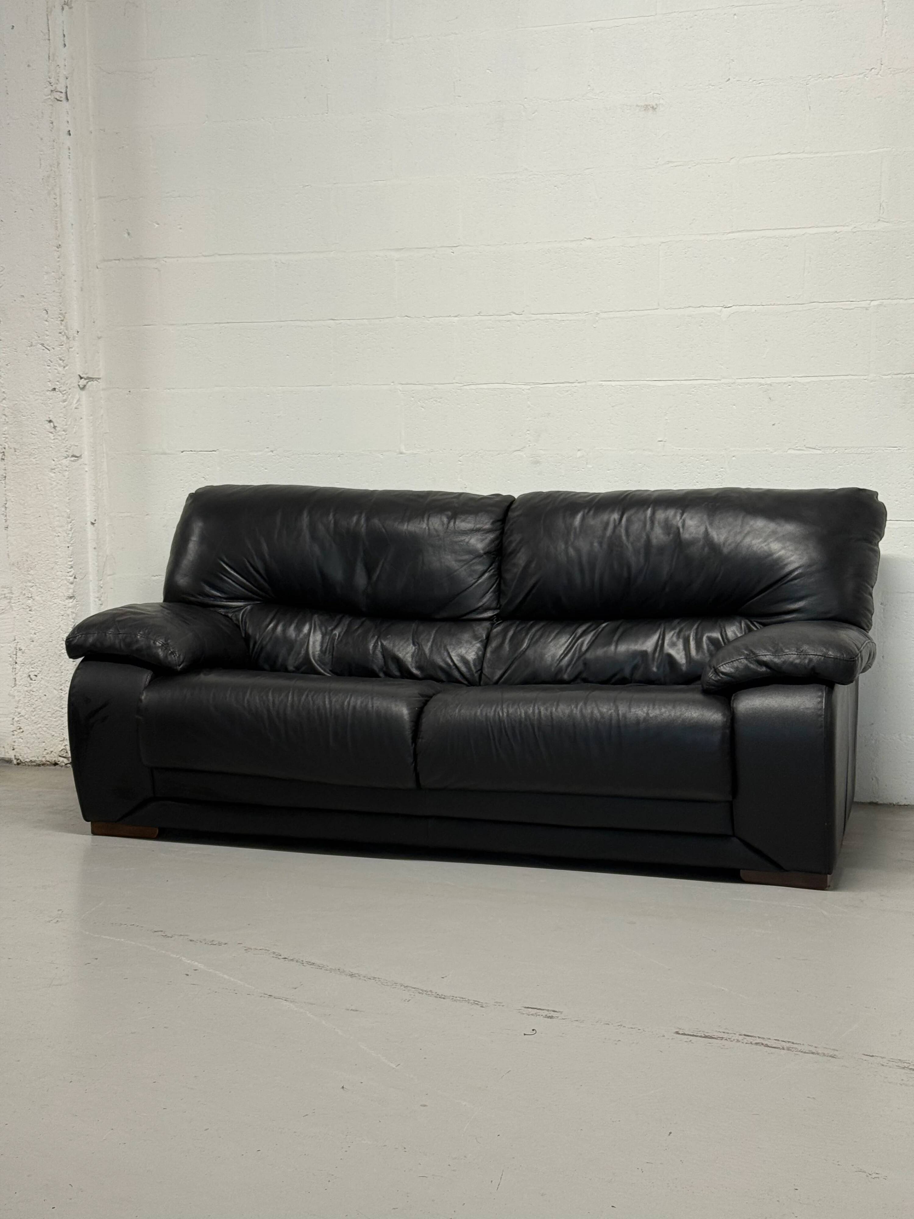 Black leather sofa — Italian postmodern design