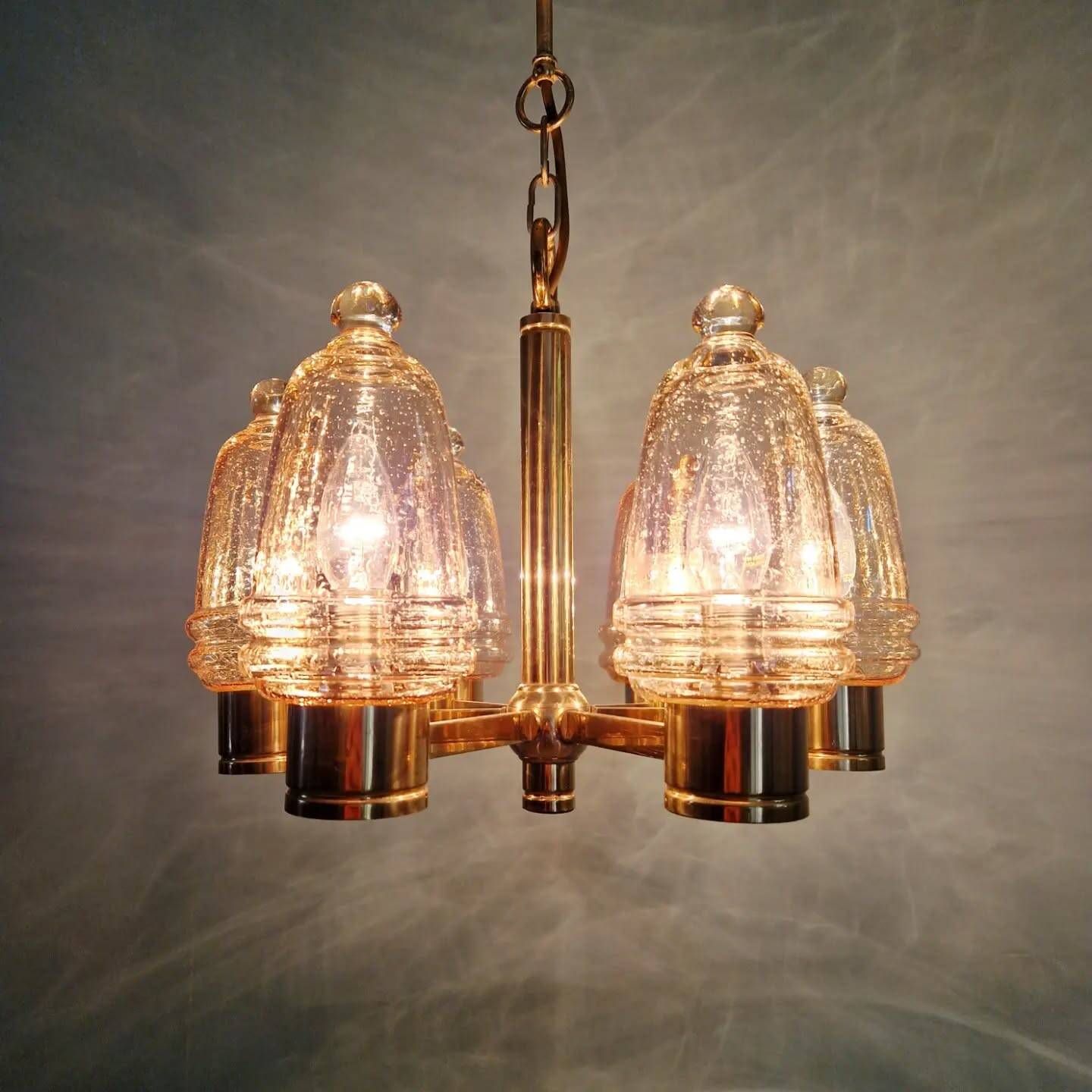 Brass chandelier with amber bubbled glass globes, 1970.