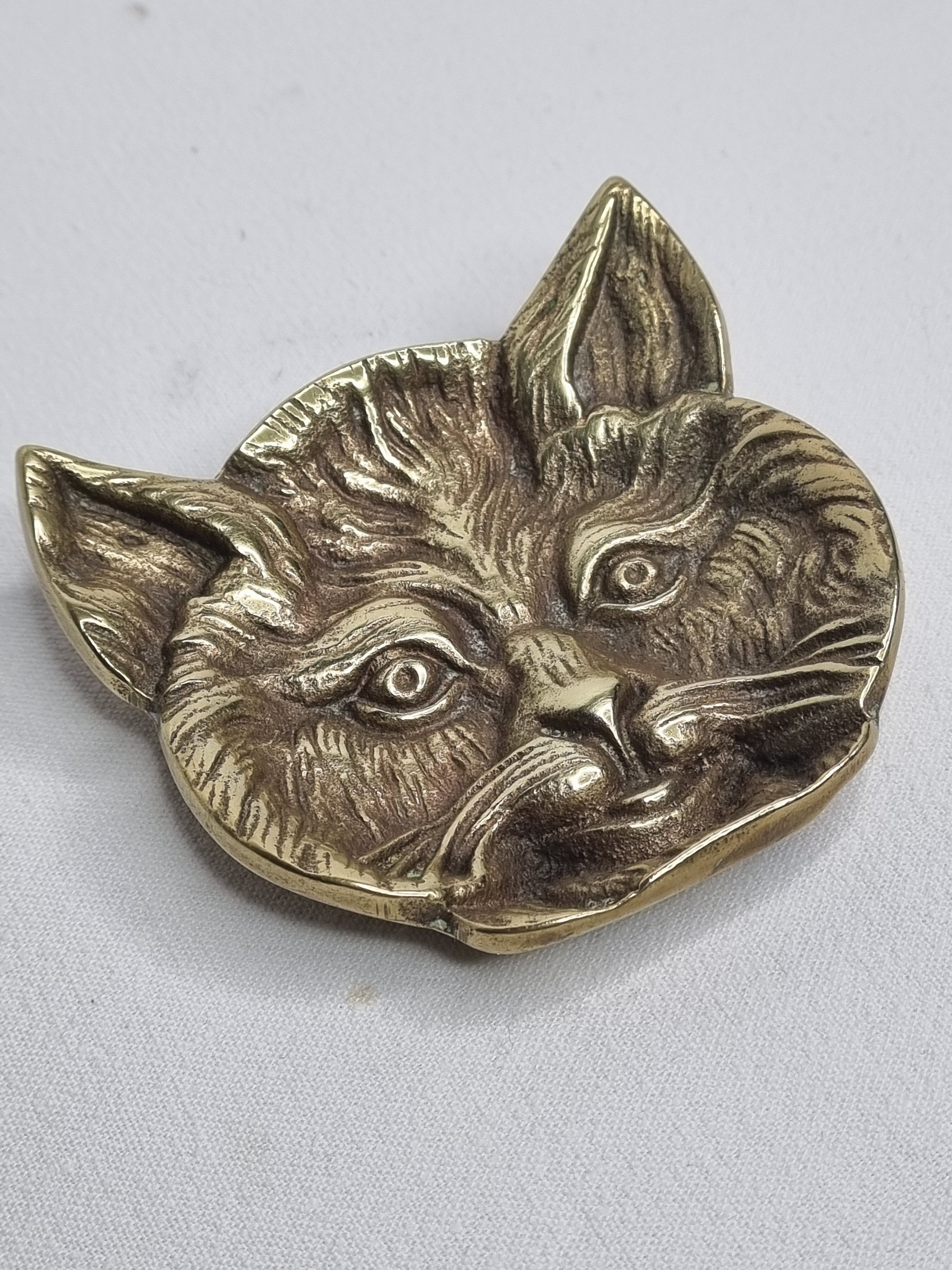 Massive brass cat head paper press