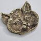 Massive brass cat head paper press