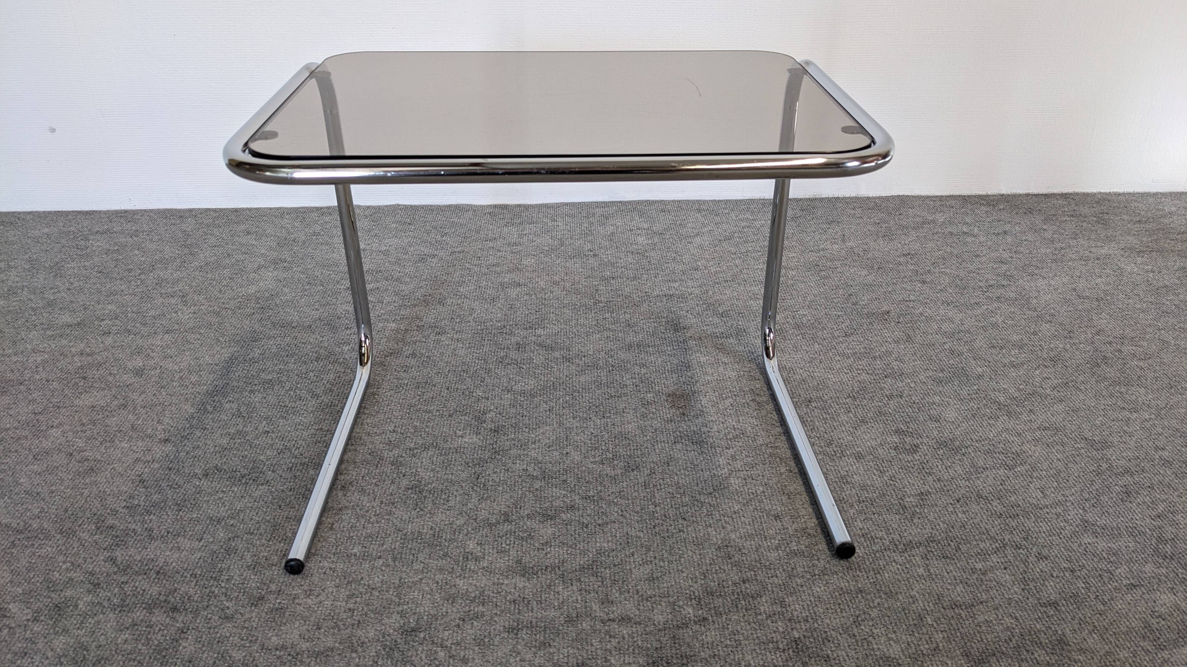 Nested tables with tubular chrome and smoked glass, France 1970.