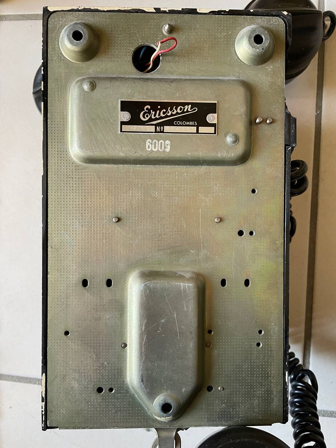 Old Ericsson wall telephone in black bakelite