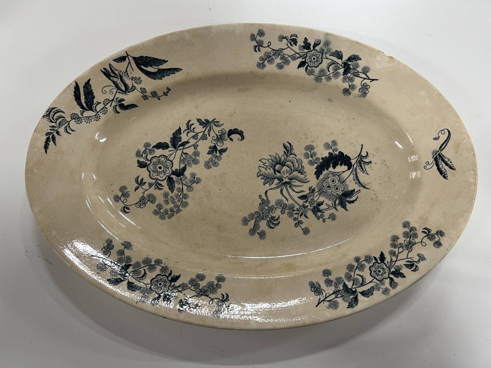 Plat ovale en porcelaine longwy signé yeho