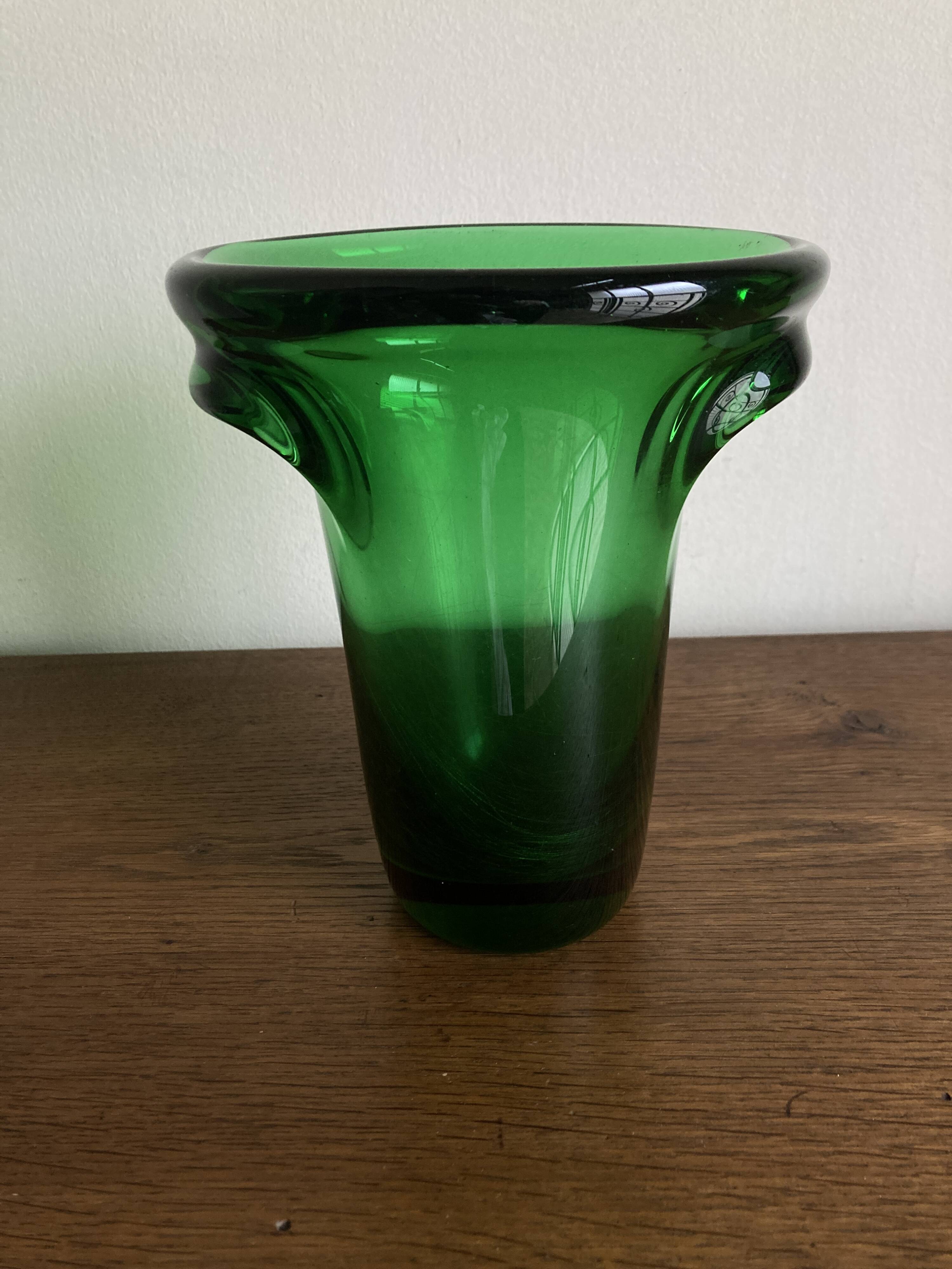 1950s Médicis vase, large Art Deco with handles, made of green blown glass.