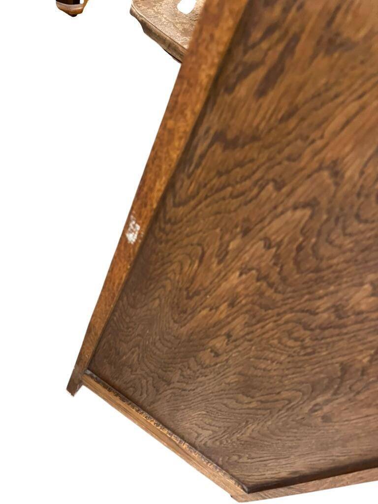 Vintage wooden display cabinet with textured glass.