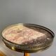 Burgundy marble pedestal table