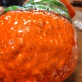 Orange slipware pitcher