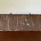 Patinated wood and metal coat rack from the 1950s.