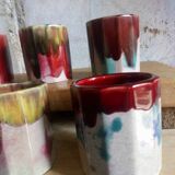 Six old yoghurt pots in enamelled porcelain