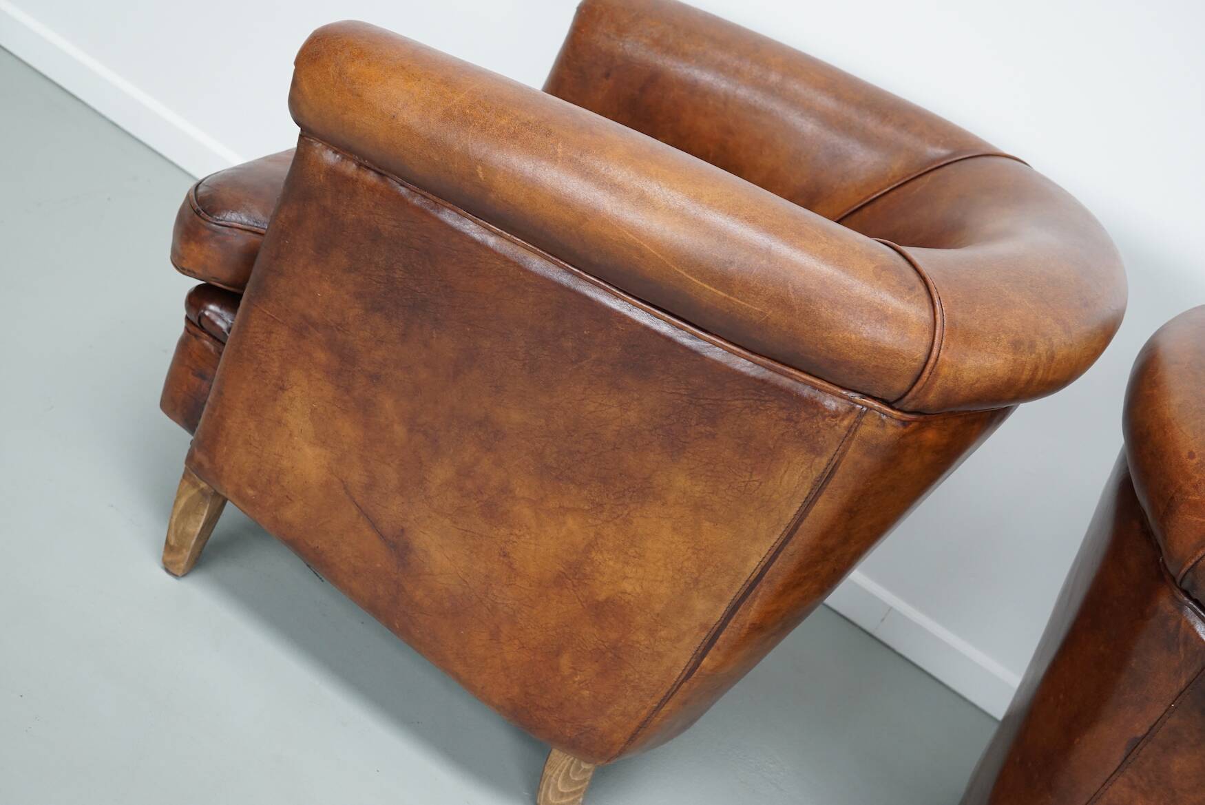 Vintage Dutch cognac coloured leather club chair, set of 2 with footstool