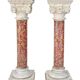 Pair of Brocatelle marble columns and stone with Corinthian capitals.