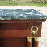 Flamed mahogany enfilade with sea green marble in Empire style.