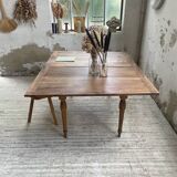Walnut farmhouse table with swivel and extendable top