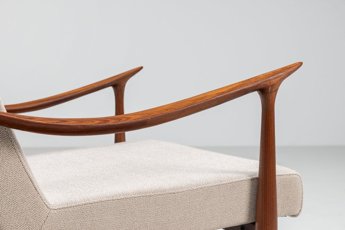 Sculptural Danish lounge chair in teak and fabric Denmark 1960