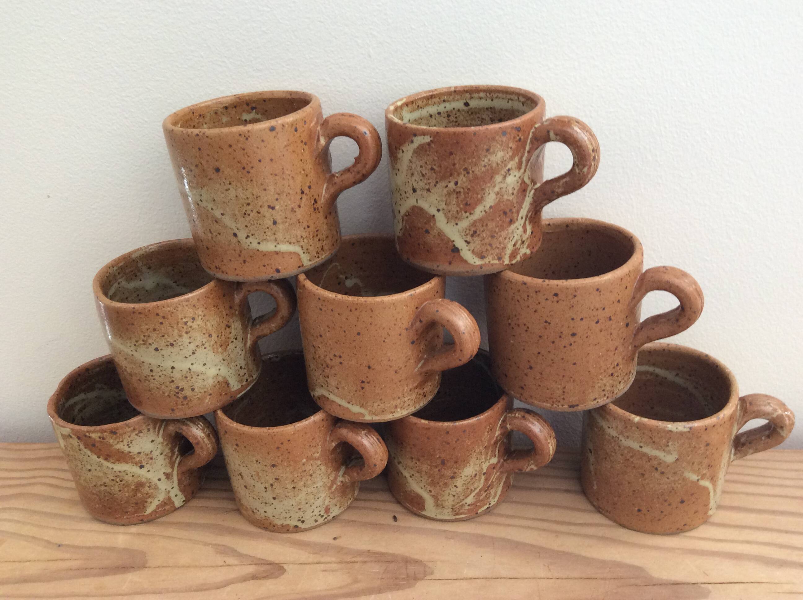 9 stoneware coffee cups