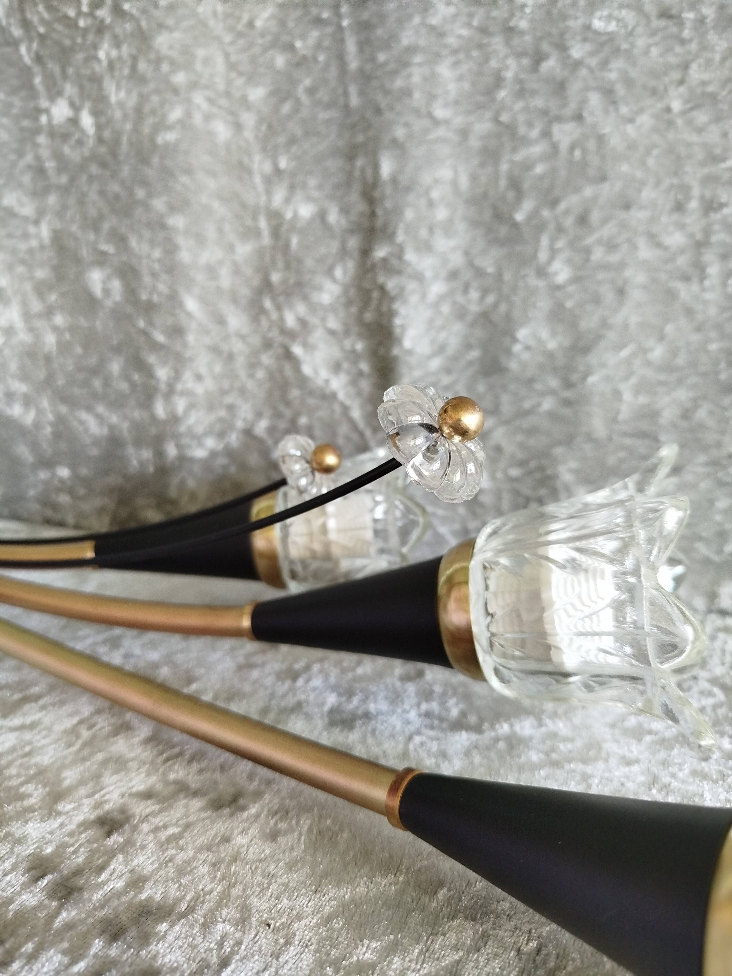 Pair of Lunel wall lights in brass and glass