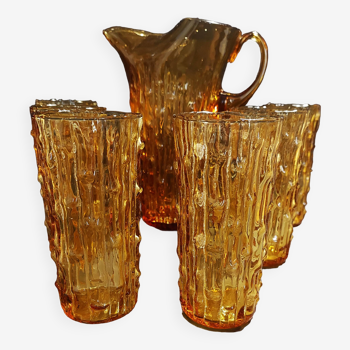 Orangeade service pitcher and six glasses textured amber glass Empoli Italy 1970