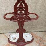 Patinated cast metal umbrella holder
