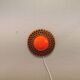Wall light made from brown and red ceramic. Signed Norman Motala Sweden 1970s.