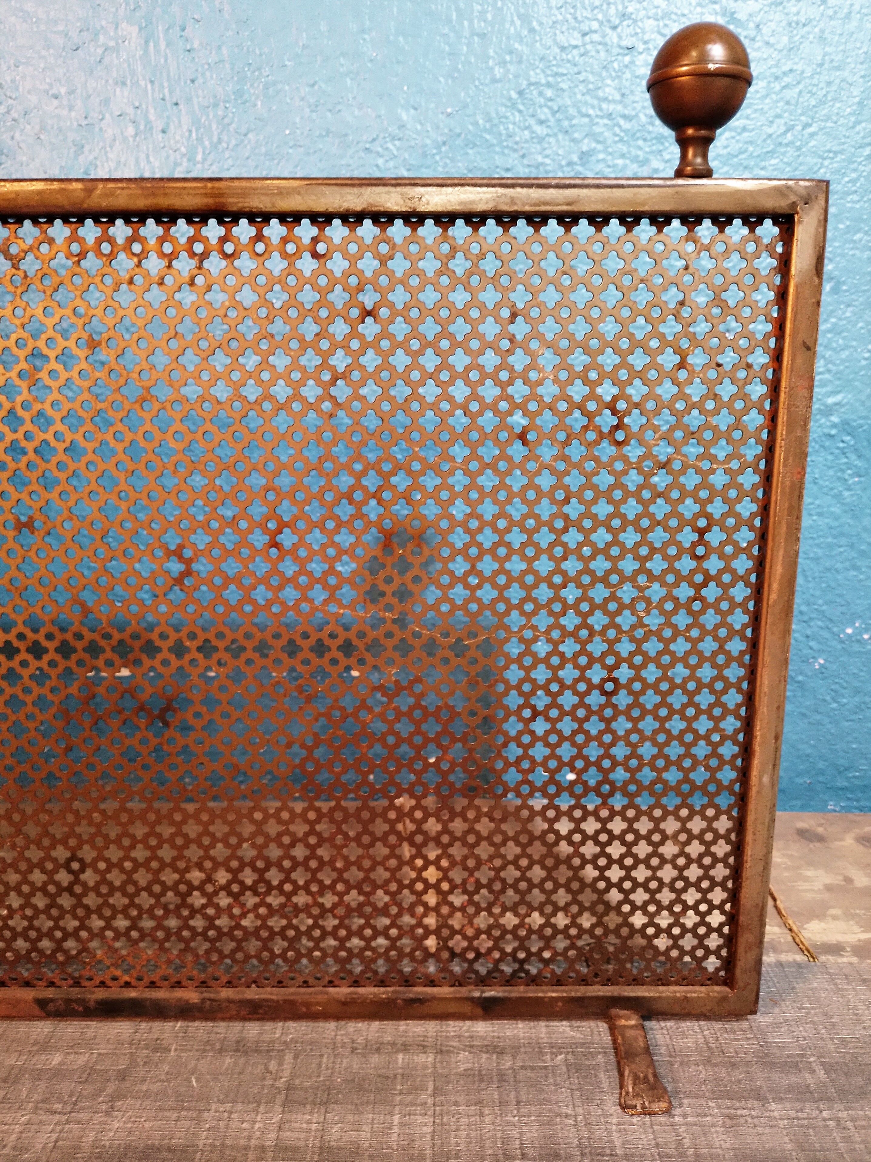 Perforated metal fire screen 1950s