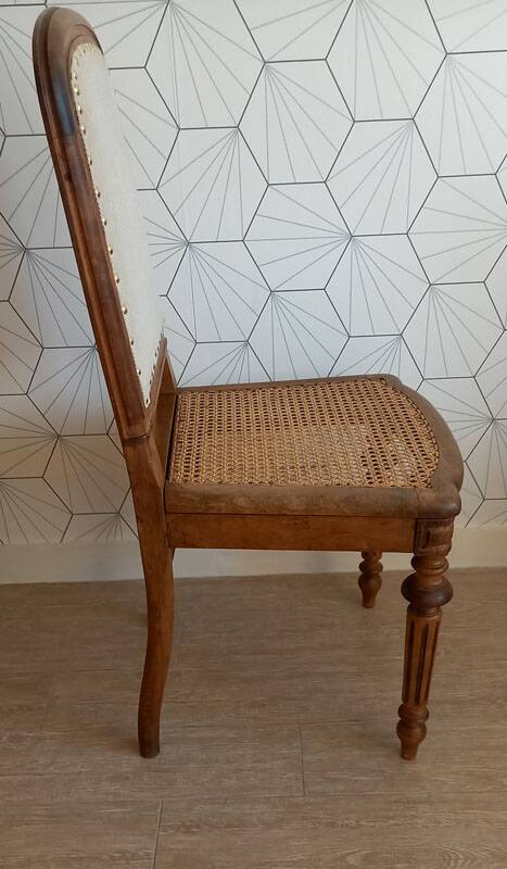 Solid oak art deco chair with cane and fabric.