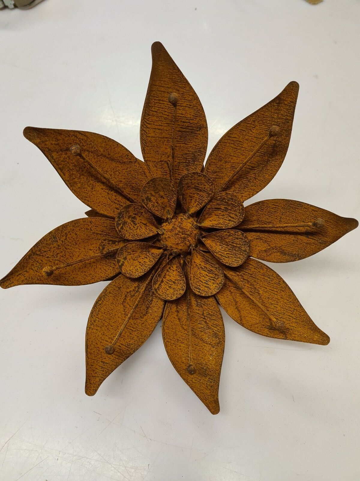 Iron flower on stem, garden decoration