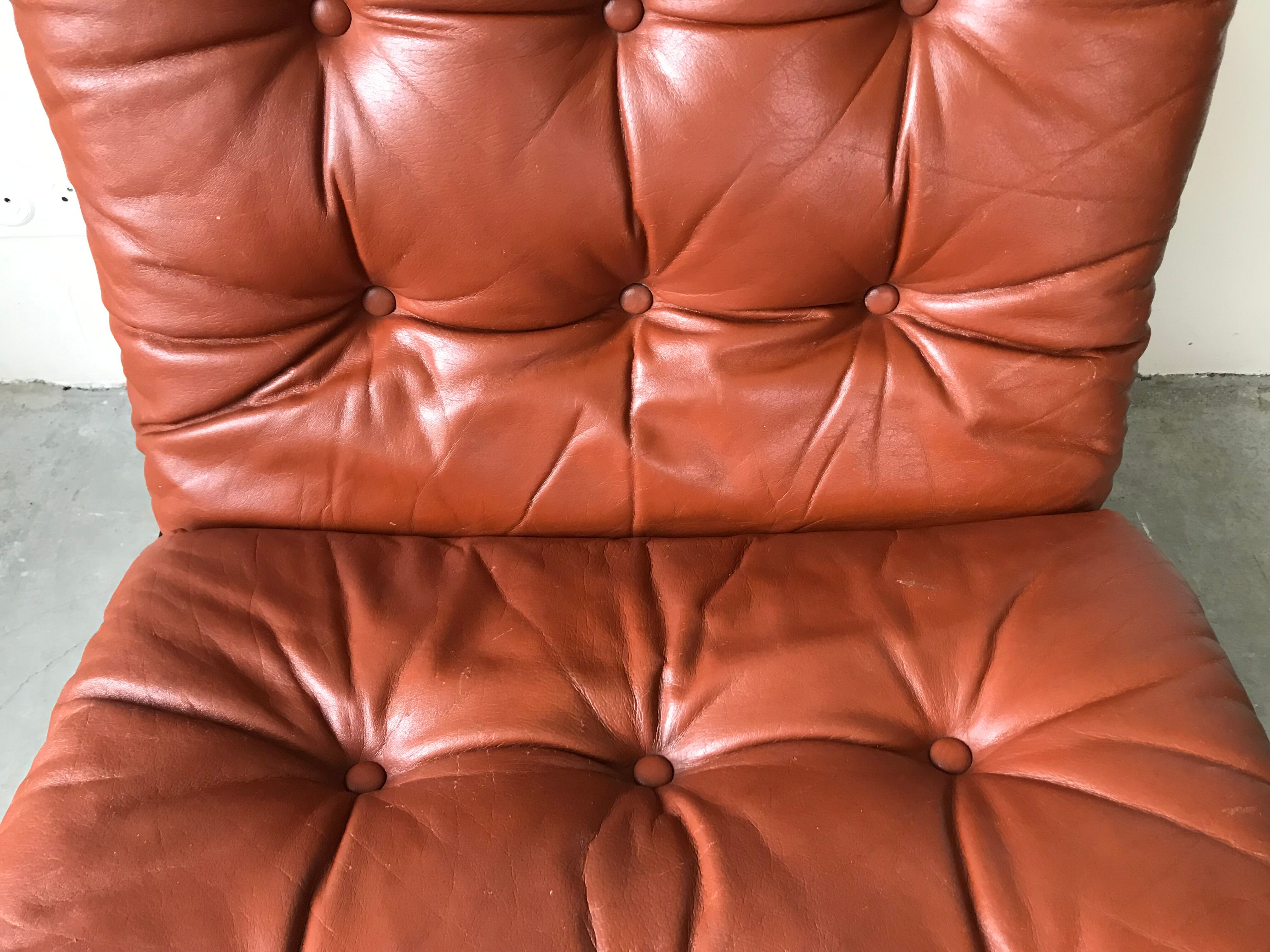 Scandinavian folding armchair in cognac leather