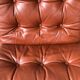 Scandinavian folding armchair in cognac leather