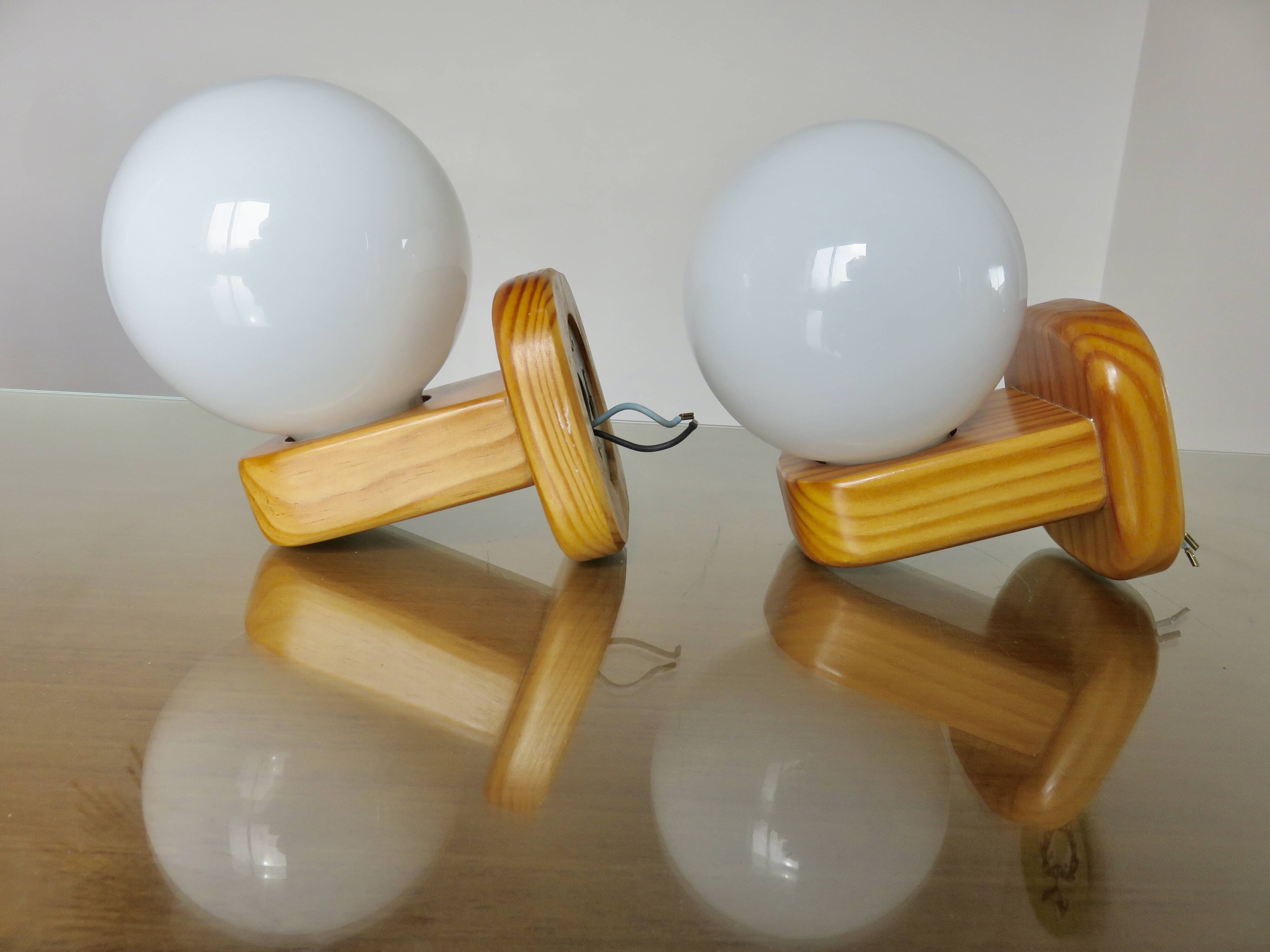 Pair of Scandinavian wall lights in pine and white opaline, 1980s.