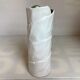 Vase with patterns of rolled paper leaves
