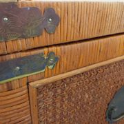 Vintage trunk in wood, rattan, caning, and brass.