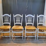Series of 4 white straw chairs countryside