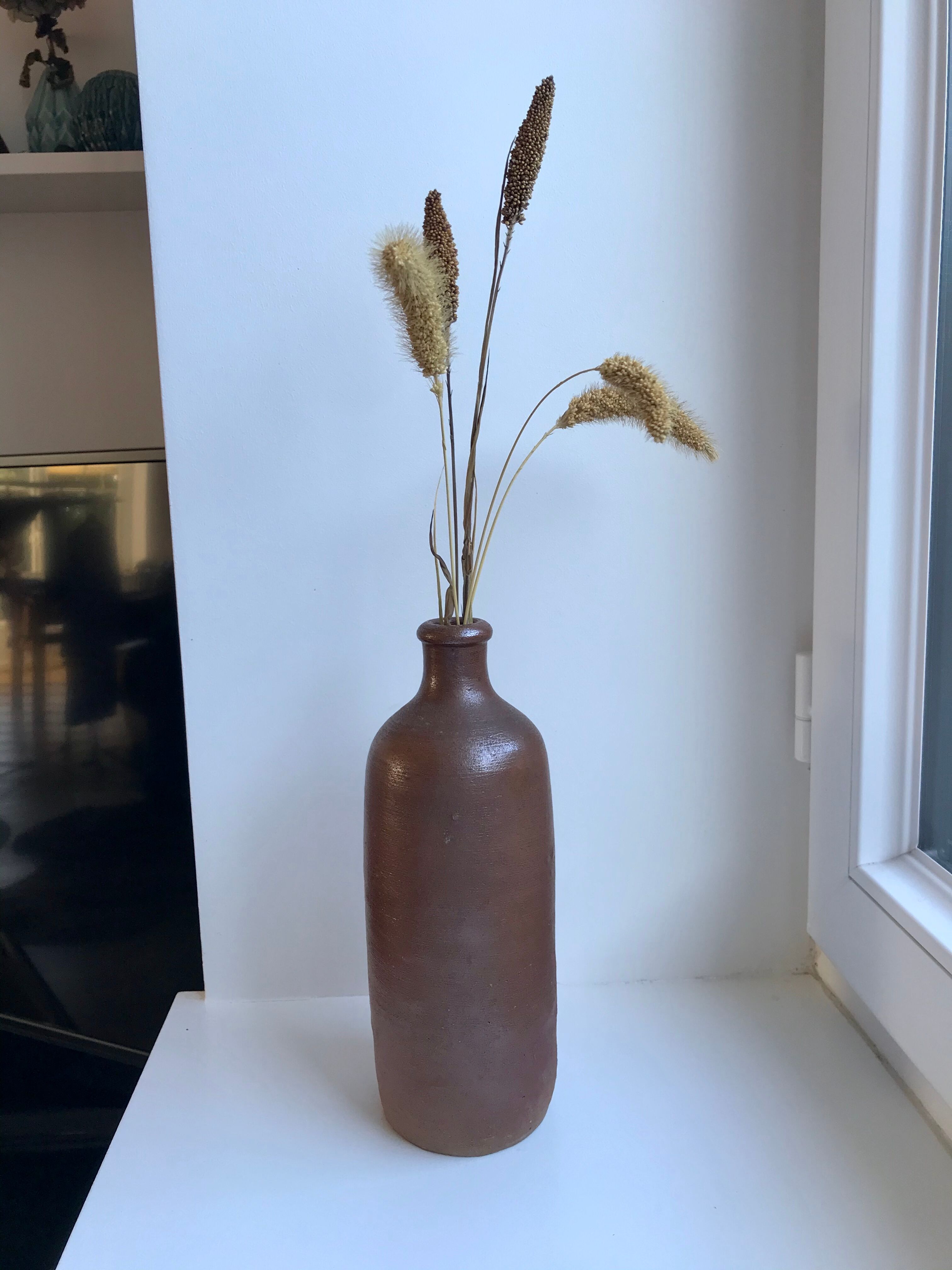 Stoneware bottle handmade early twentieth century