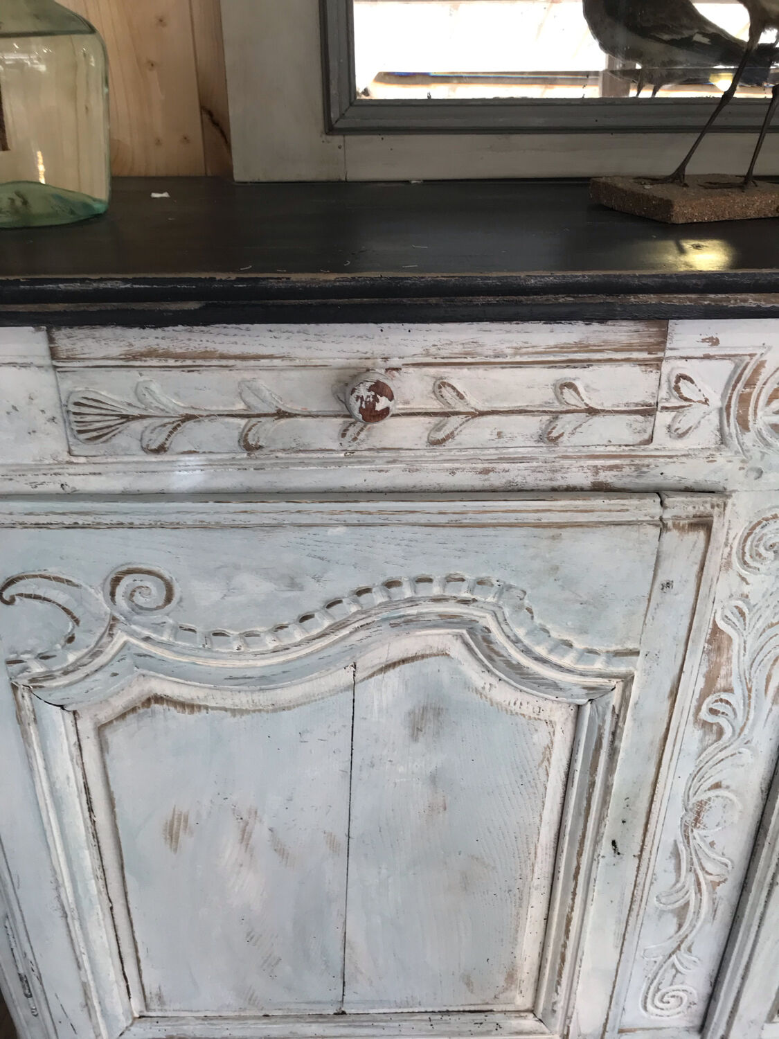 Patinated carved sideboard