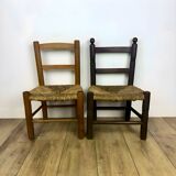 Pair of old wooden and straw children's chairs.