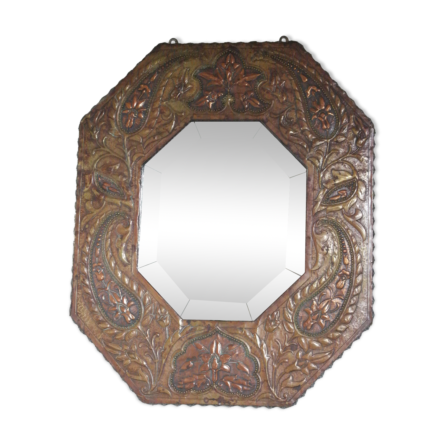 Antique bevelled artisanal mirror in repoussé copper - 54x45cm