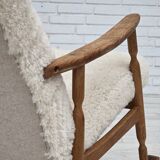 1970s, Danish rocking chair, reupholstered in quality genuine sheepskin.