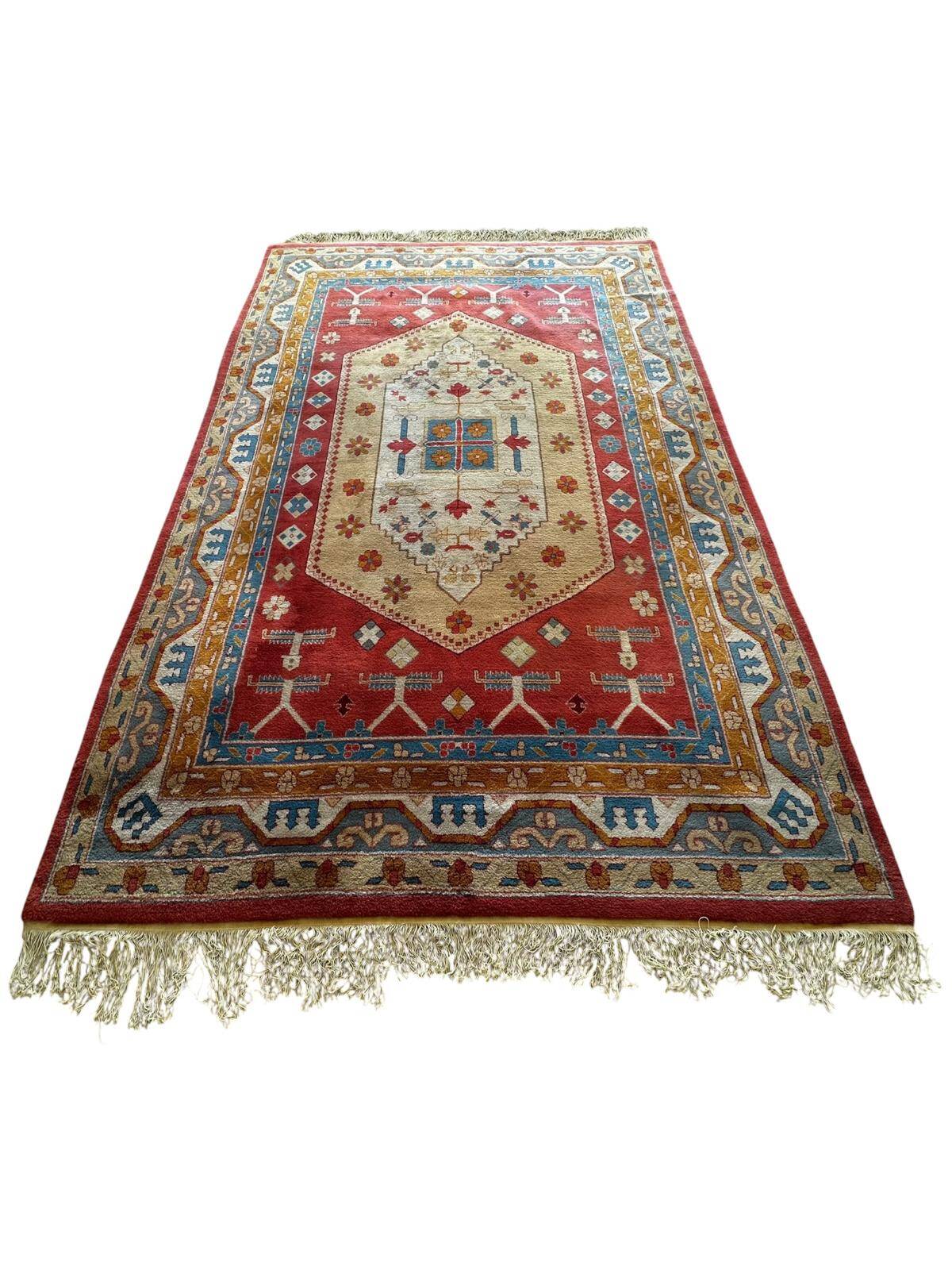 Large handmade oriental rug 240cm x 350cm