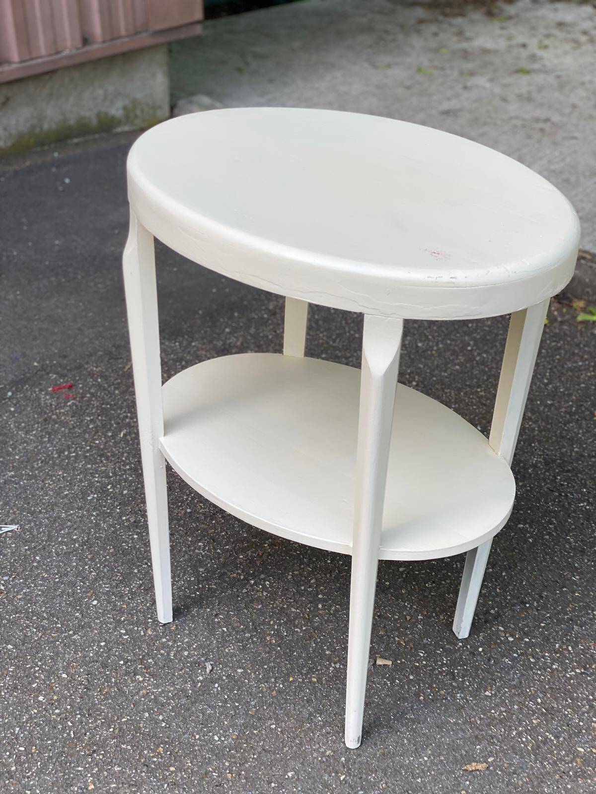 Vintage solid wood stool painted in beige.