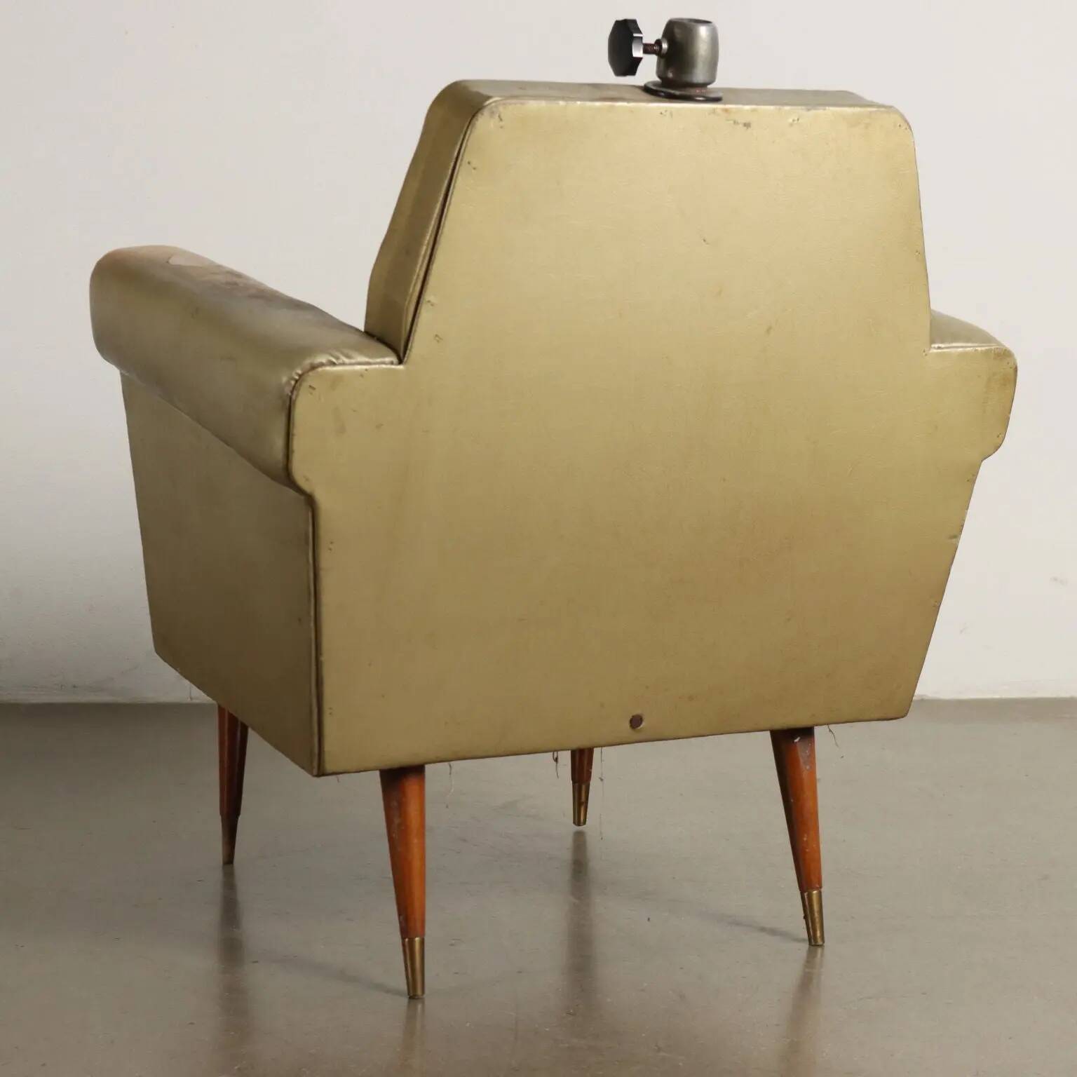 Pair of vintage armchairs from the 1950s in wood and faux leather, Argentina.