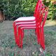 Stackable chairs, Italy, 1980s, red metal, white vinyl