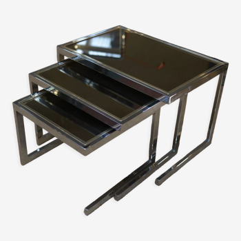 Design nesting table in chromed metal and glass 1970