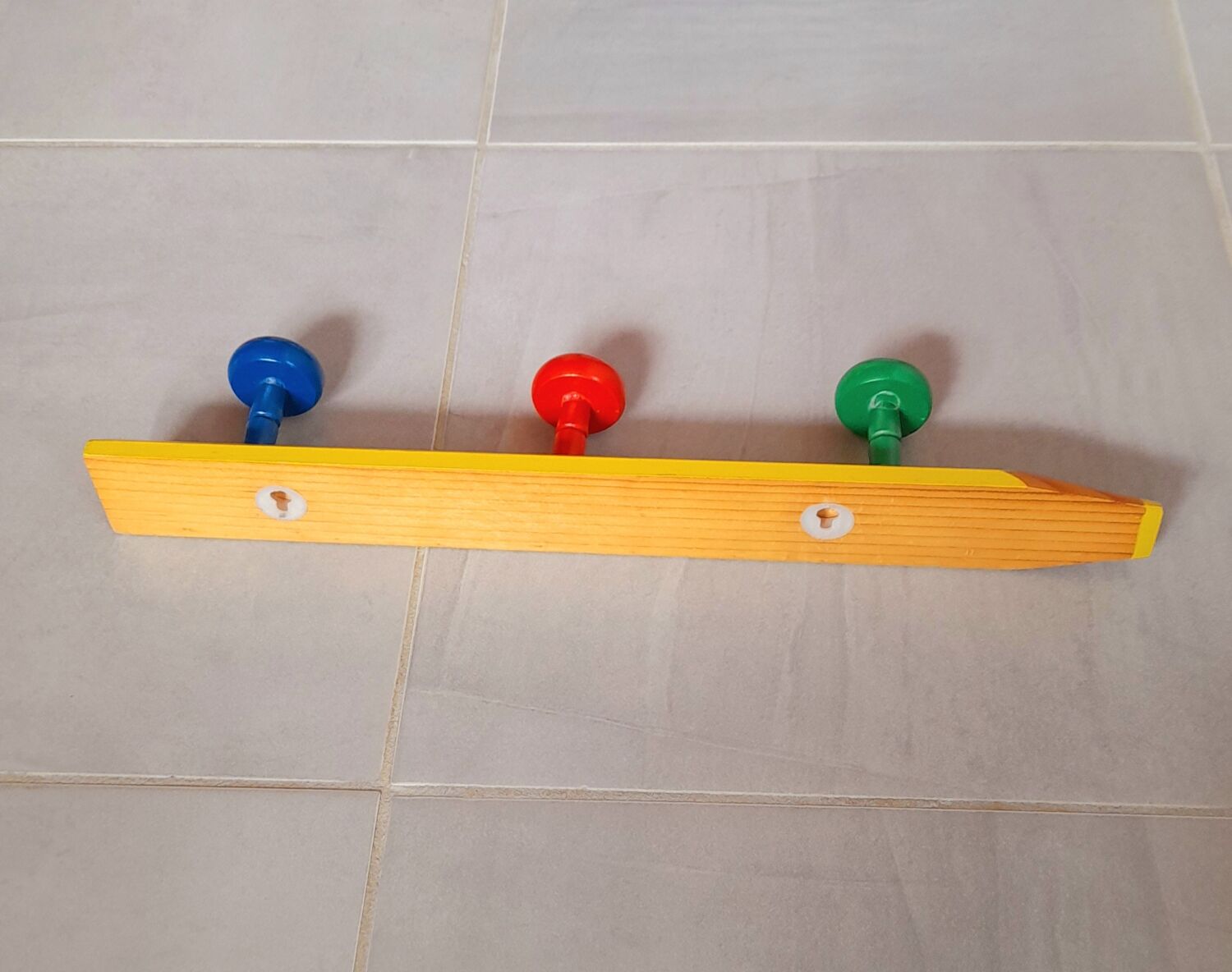 Pencil wall coat rack