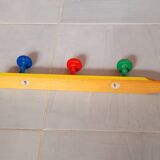 Pencil wall coat rack