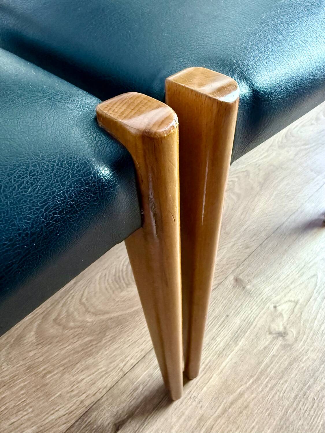 Set of 4 wooden and black leatherette chairs